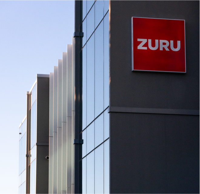 ZURU office building exterior, modern building with red ZURU logo on exterior